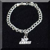 J07. Sterling silver bracelet with ”I love karate” charm. 6.5” - $18